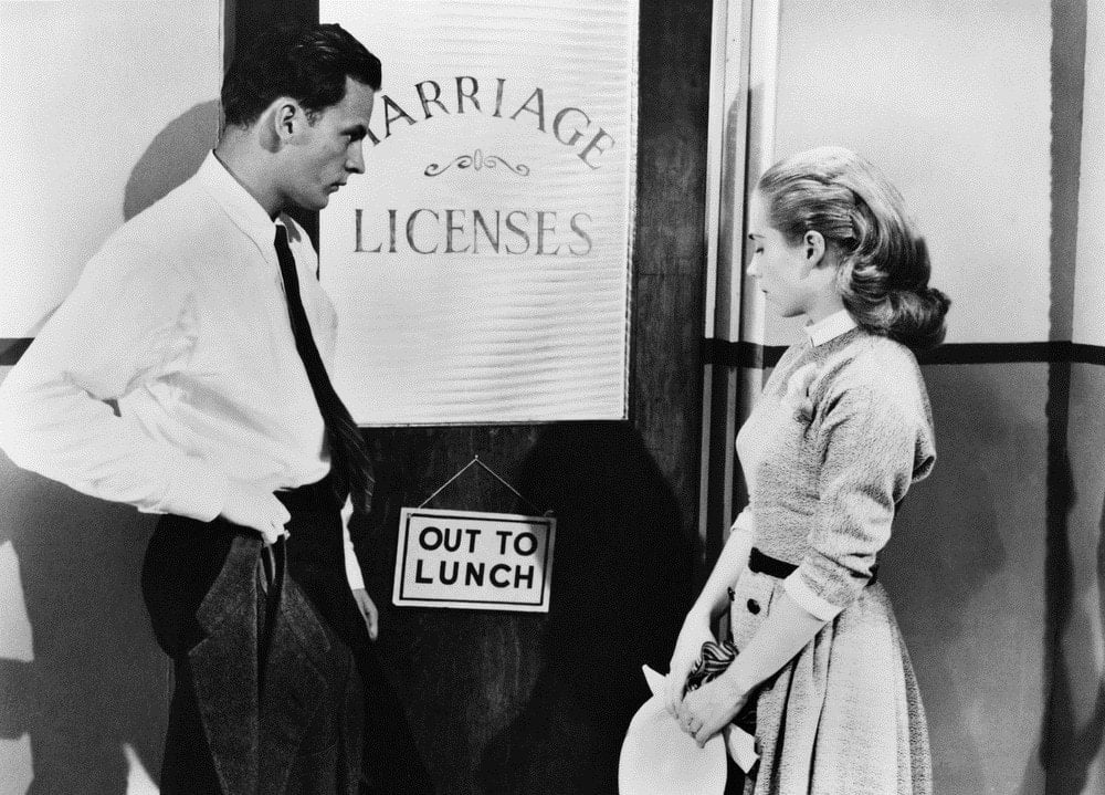 Couple waiting at registry to get married