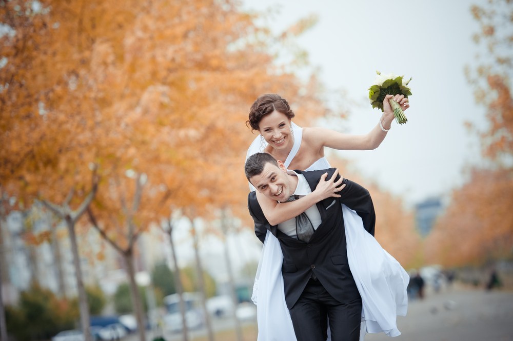 Couple piggyback - just married