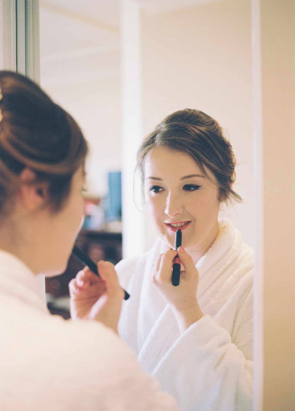 Woman applying a makeup