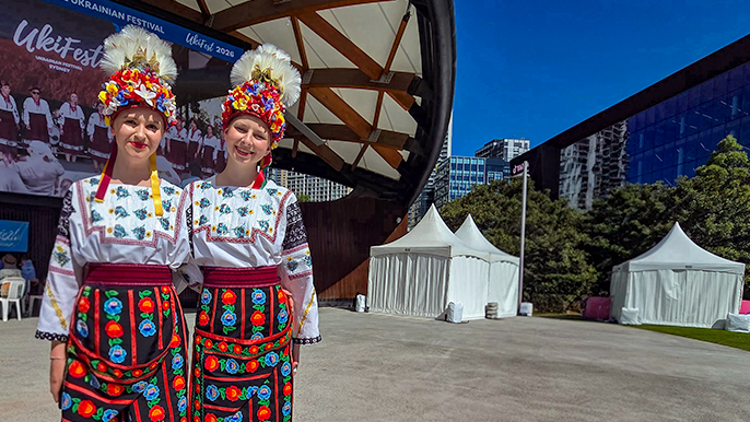 Uki-Fest Darling Harbour two models wear traditional clothing. 